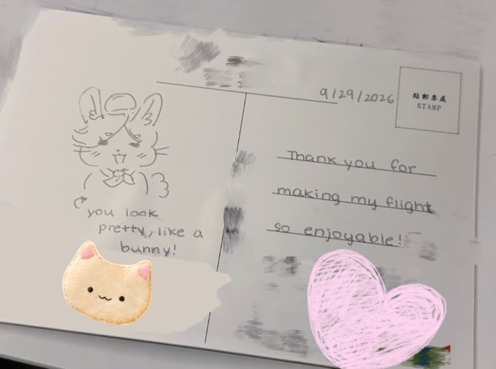 メッセージが書かれたポストカードの写真